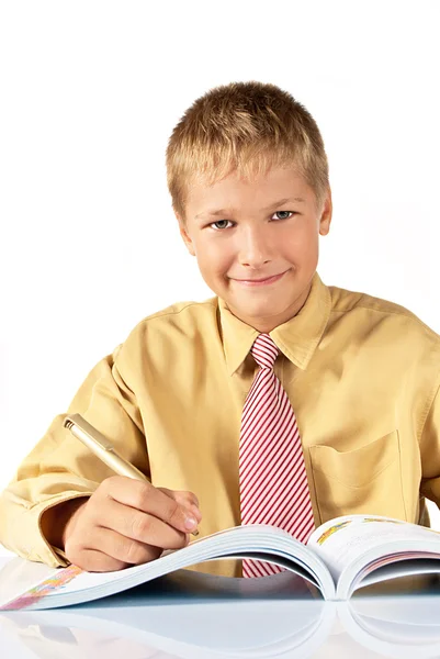 The schoolboy the teenager is trained for business life — Stock Photo, Image