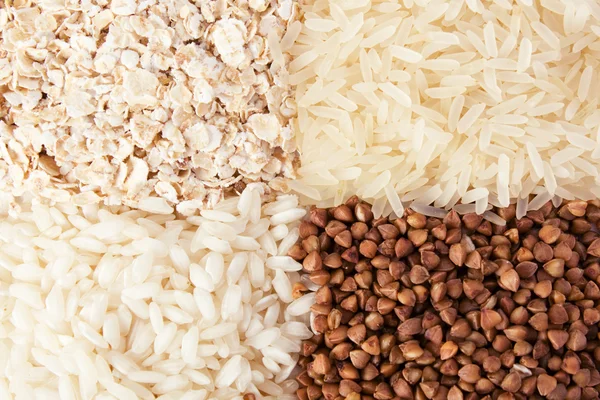 Rolled oats, rice and buckwheat — Stock Photo, Image