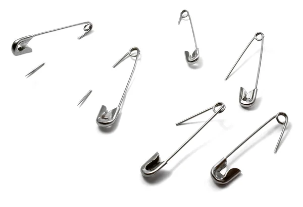 Open safety pin in white background — Stock Photo, Image