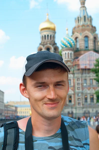 Stock image Smiling men against the Church of the savior