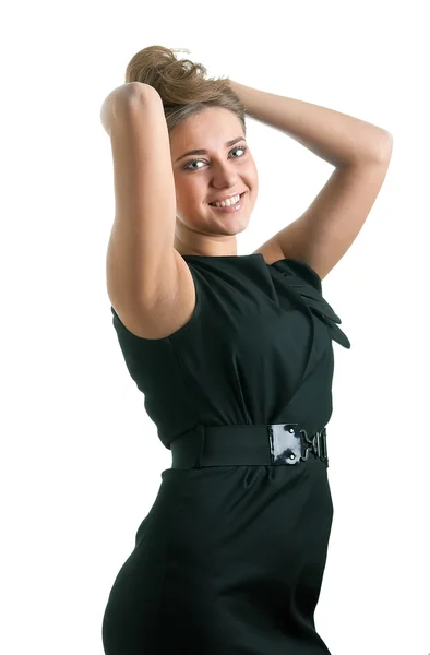 Usměvavá dívka v černých šatech — Stock fotografie