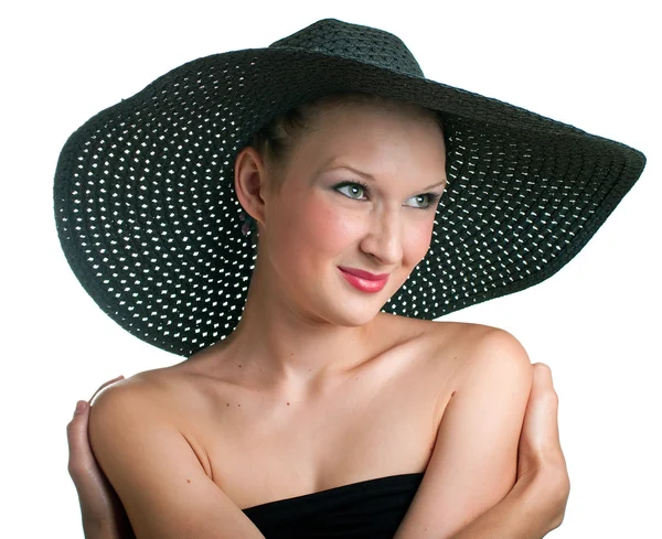 微笑中戴着黑色帽子的妇女 — 图库照片