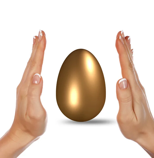 Golden Egg and hands — Stock Photo, Image