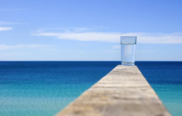 Glass with crystal clear water — Stock Photo, Image