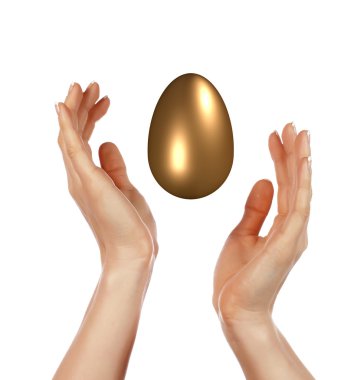 altın yumurta ve eller