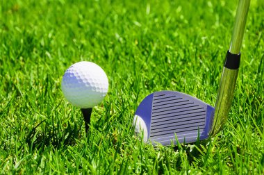 Ball and golf clubs clipart