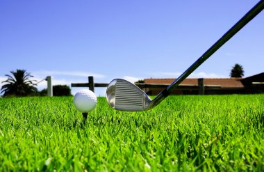 Ball and golf clubs clipart