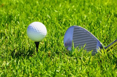 Ball and golf clubs clipart