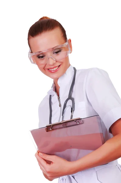 Jovem enfermeira de uniforme branco — Fotografia de Stock
