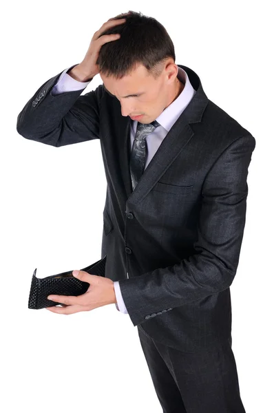 Homem de negócios olhando para sua carteira vazia — Fotografia de Stock