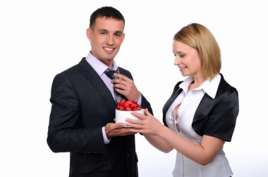 Young business man presents his gift clipart