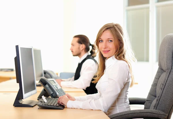 Young girl in his office — Stock Photo, Image