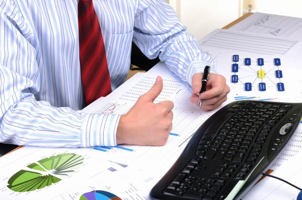 Young business man working in an office — Stock Photo, Image
