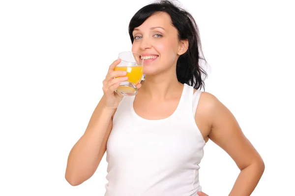 Giovane donna incinta che beve arancione — Foto Stock