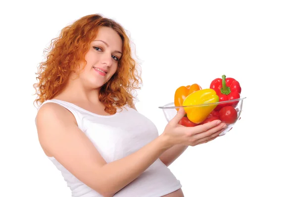 Young redhead pregnant mom Stock Image