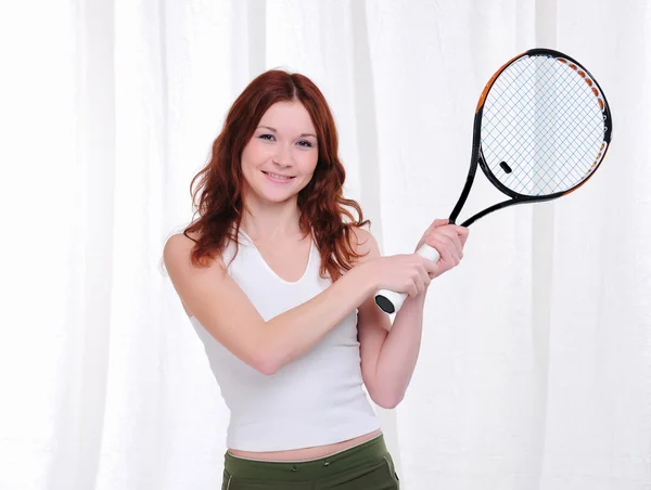 Menina com uma raquete de tênis — Fotografia de Stock