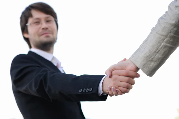 Shaking hands on a light background — Stock Photo, Image