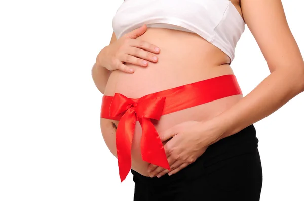 Addome una giovane donna incinta — Foto Stock