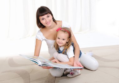 Young mother and her daughter clipart