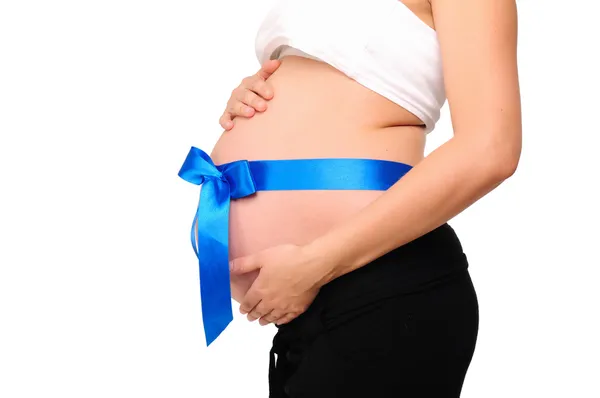 Живот молодая беременная женщина — стоковое фото