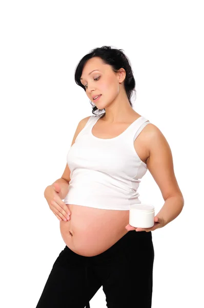 Junge schwangere Mutter — Stockfoto