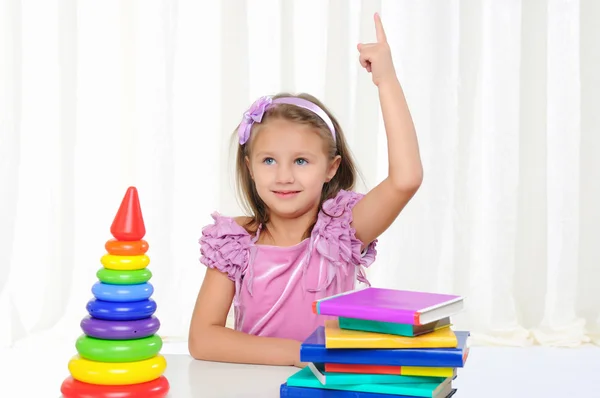 Little girl is studying literature — Stock Photo, Image