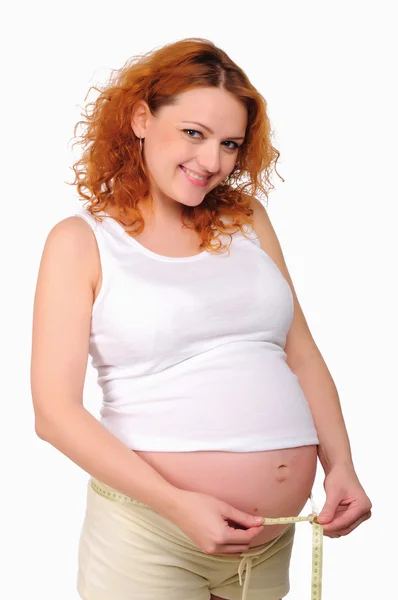 Young pregnant mom measure — Stock Photo, Image