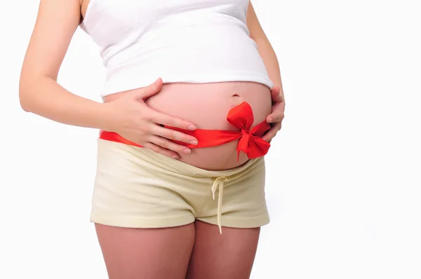 Abdômen uma jovem mulher grávida — Fotografia de Stock