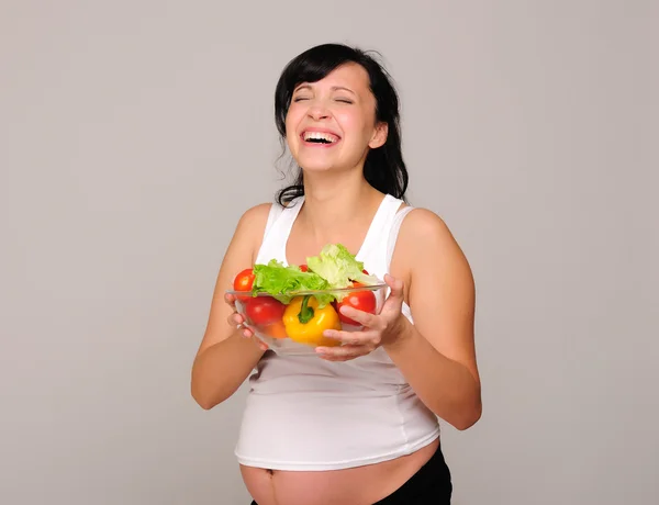 Junge schwangere Frau — Stockfoto