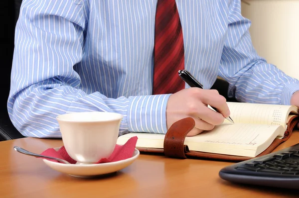 Young business man working in an office — Stock Photo, Image