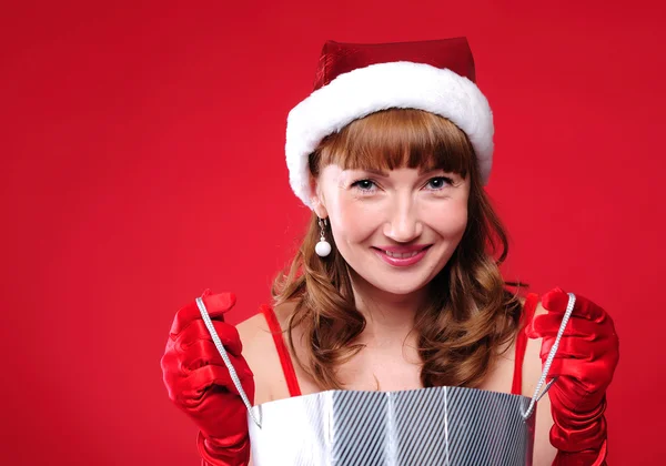 Ung flicka klädd som jultomte — Stockfoto