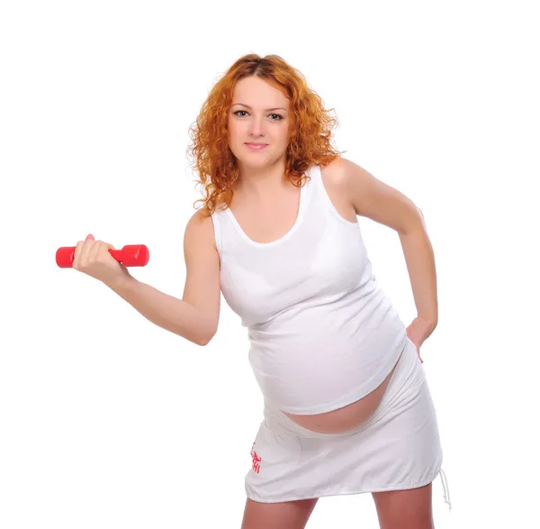 Jovem menina grávida de cabelos vermelhos — Fotografia de Stock