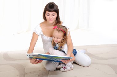Young mother and her daughter clipart