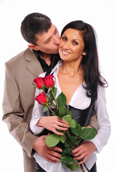 Joven le da a su novia una rosa — Foto de Stock