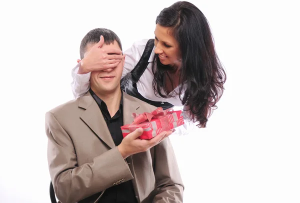 Young girl gives her man a gift — Stock Photo, Image