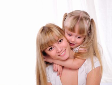 Little girl and her mother clipart