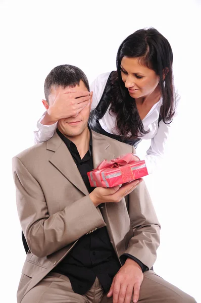 Young girl gives her man a gift — Stock Photo, Image
