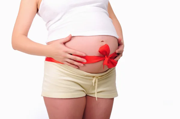 一个年轻的孕妇腹部 — 图库照片