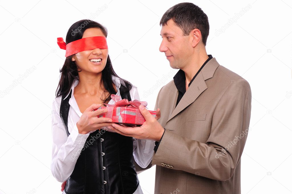 Young man gives his girlfriend a gift
