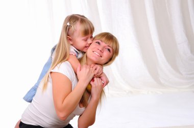 Little girl and her mother clipart