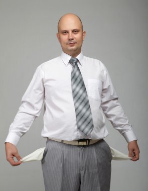 Bald businessman in a gray suit