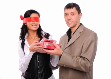 Young man gives his girlfriend a gift clipart