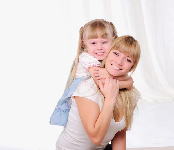 Malá holčička a její matka — Stock fotografie