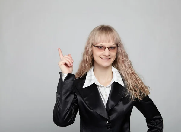 Mulher de negócios engraçada em um terno preto — Fotografia de Stock