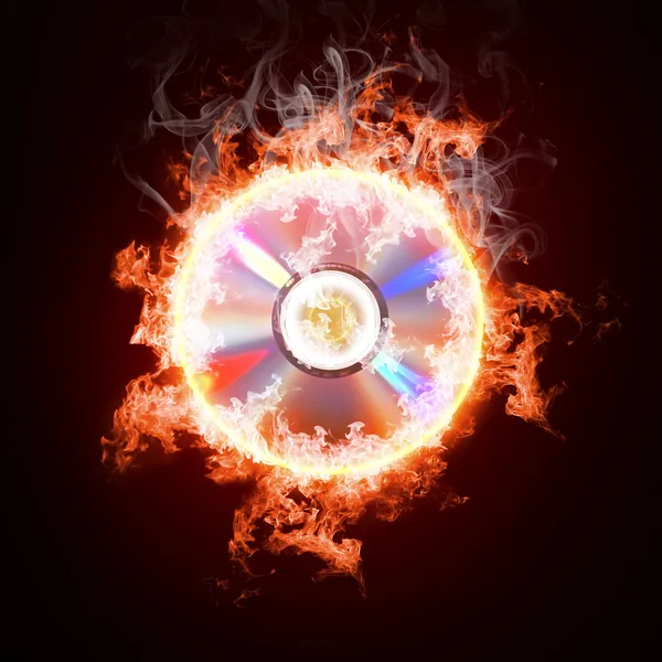 Music CD in open fire — Stock Photo, Image