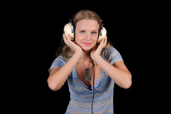 Молода дівчина з навушниками — стокове фото