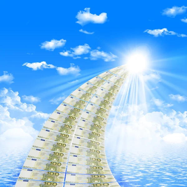 Road from banknotes disappearing into a bright blue sky. — Stock Photo, Image