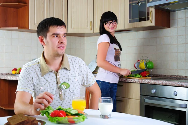 Young couple at breakfast — Stock Photo, Image