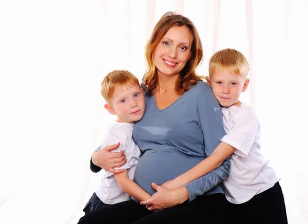 Two red brothers and their pregnant — Stock Photo, Image