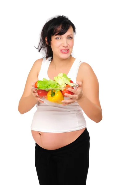 一个年轻的孕妇选择健康的天然食品 — 图库照片